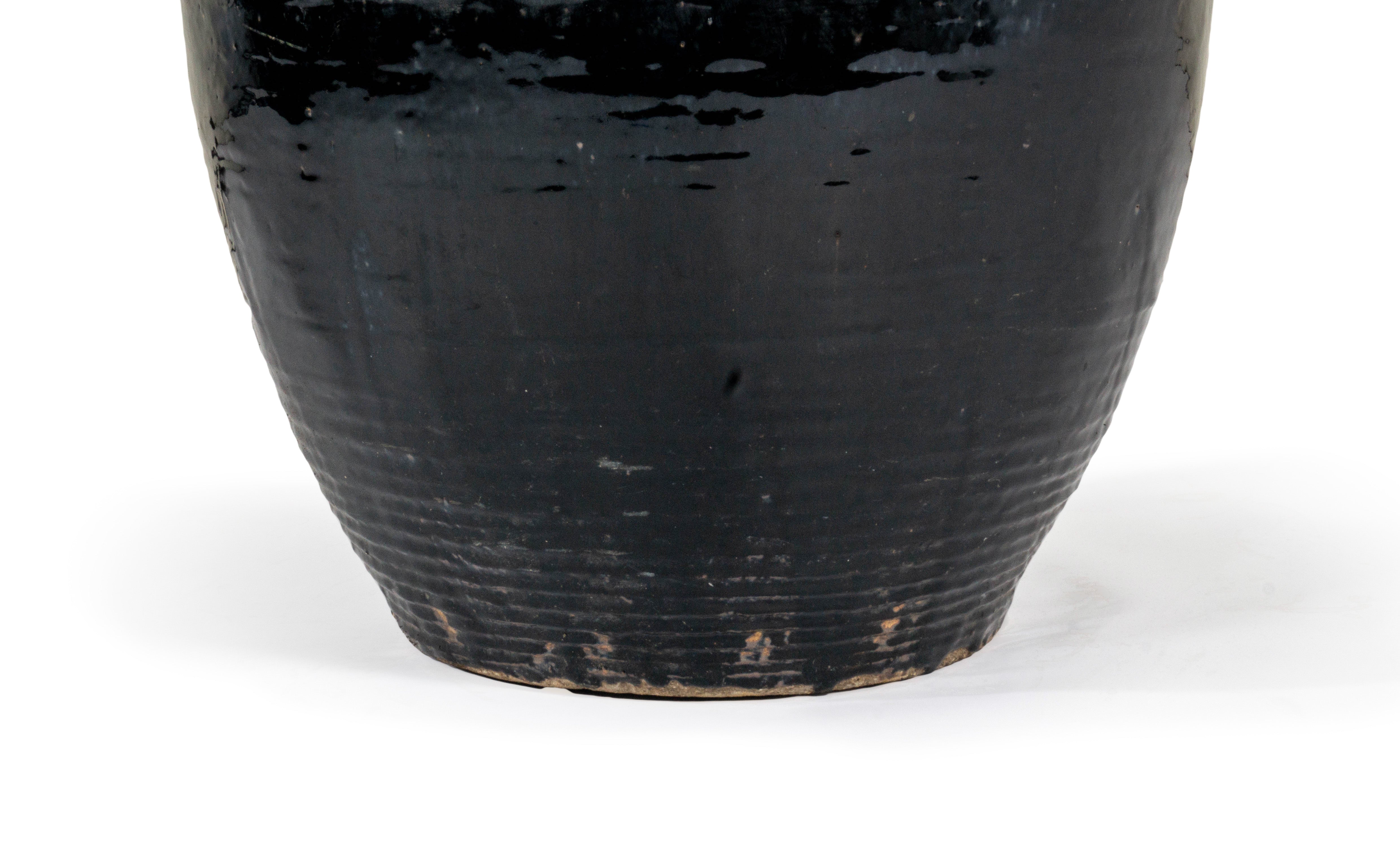 Short Black Glazed Terra Cotta Storage Vase